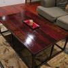Large Coffee Table built with wood from a vintage seeder. Patina steel finish. 