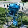 1957 Champion outboard motor. This motor was found new in the box. Stand/Table was custom built.
3/8" tempered glass top. 