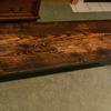 Bed bench with chain as a design element and using vintage circular cut red pine planks. 