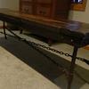 Bed bench with chain to four corners, meeting in the middle. 