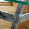 Finish on the steel rocking horse table frame. 