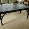 Coffee table with steel surrounding  the recoverd red pine planking. 